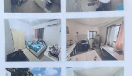 Edificio de 3 apartamentos y 5 locales comerciales